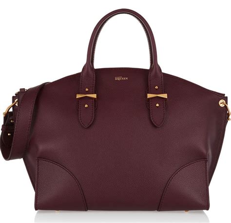 burgundy handbags website.